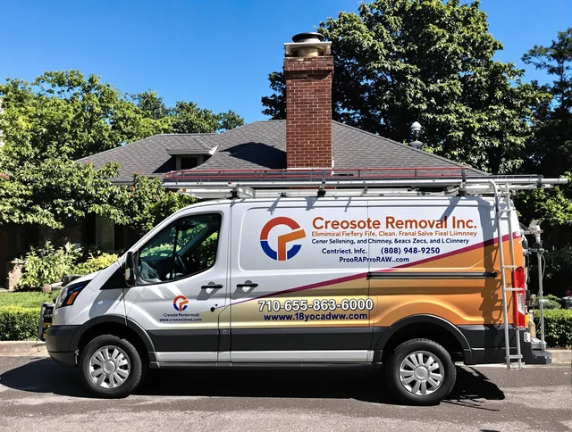 Holliston Chimney Sweep technician removing creosote safely in Holliston, MA