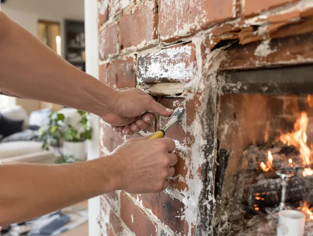 Routine fireplace repair by Holliston Chimney Sweep in Holliston, MA
